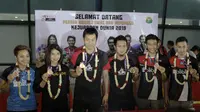 Mohammad Ahsan/Hendra Setiawan tiba di Jakarta setelah meraih gelar Juara Dunia 2019. (Bola.com/Yoppy Renato)