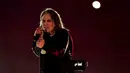 <p>Bintang rock Ozzy Osbourne tampil dalam upacara penutupan Commonwealth Games di Alexander Stadium, Birmingham, Inggris, 8 Agustus 2022. Osbourne mengatakan kepada orang banyak: "Aku mencintaimu, Birmingham - senang bisa kembali!. (David Davies/PA via AP)</p>