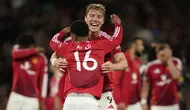 Penyerang Manchester United, Rasmus Hojlund, mencetak satu gol dan membantu timnya menang 4-1 atas Athletic Bilbao pada laga leg kedua semifinal Liga Europa di Old Trafford, Jumat (9/5/2025) dini hari WIB. Hasil tersebut membuat MU menang agregat 7-1 dan lolos ke final. (AP Photo/Dave Thompson)