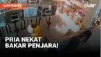 Seorang pria tak dikenal tiba-tiba masuk ke dalam lobi penjara dan langsung menuangkan cairan bahan bakar ke lantai. Api langsung berkobar besar sesaat setalah pelaku membakarnya.