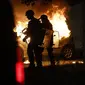 Wali Kota Marseille Benoit Payan meminta pemerintah nasional untuk segera mengirim pasukan tambahan guna menangani kerusuhan Prancis. "Adegan penjarahan dan kekerasan tidak dapat diterima," katanya dalam sebuah tweet pada Jumat malam. (AP Photo/Jean-Francois Badias)
