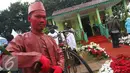 Salah satu Manusia Patung di Festival Lebaran Betawi IX di Lapangan Banteng, Jakarta, Minggu (14/8). Lebaran Betawi adalah salah satu acara tahunan yang diselenggarakan Pemprov DKI Jakarta dan Bamus Betawi. (Liputan6.com/Immanuel Antonius) 