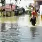 Ratusan rumah di Kota Sampang terendam banjir.