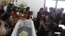Suasana prosesi Mandok Hata Horong Ni Hula-hula di rumah duka Fatmawati, Jakarta, Sabtu. (27/08). Prosesi adat batak mengiringi almarhum ke tempat peristirahatan terakhir. (Liputan6.com/Herman Zakharia)