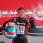 Travis Fisiano, pembalap gocart cilik yang berhasil menjuarai Eshark Rok Cup Indonesia 2022. (Muhamad Husni Tamami/Liputan6.com)