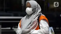 Bupati nonaktif Kolaka Timur, Andi Merya Nur usai menjalani pemeriksaan lanjutan di Gedung KPK, Jakarta, Senin (25/10/2021). Andi Merya Nur merupakan tersangka suap dana hibah BNPB untuk Rehabilitasi dan Rekonstruksi serta Dana Siap Pakai (DSP) di Kab Kolaka Timur. (Liputan6.com/Helmi Fithriansyah)