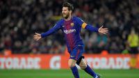 Lionel Messi mencetak dua gol saat Barcelona menang 6-1 atas Girona pada laga pekan ke-25 La Liga Spanyol, di Camp Nou, Sabtu (24/2/2018) waktu setempat. (AFP/Lluis Gene)