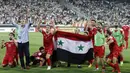 6. Suriah (Playoff) - Negara yang sedang mengalami konflik perang tersebut, kini mulai bermimpi untuk melangkah ke Piala Dunia. Menyingkirkan Uzbekistan dan China, mereka berada di posisi ketiga dan akan bertarung melalui babak playoff. (AFP/Atta Kenare)