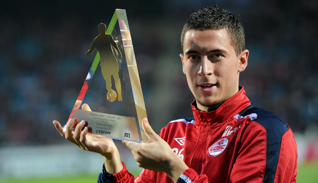 Eden Hazard. Usai tampil gemilang bersama Lille, pada akhir musim 2011/2012 ia mendapat tawaran banyak klub elite Eropa, termasuk Manchester United dan Chelsea. Akhirnya di awal 2012/2013 ia lebih memilih The Blues karena memiliki rencana terbaik ketimbang Setan Merah. (Foto: AFP/Philippe Huguen)