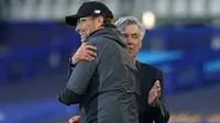 Manajer Liverpool, Jurgen Klopp, memuji kinerja Carlo Ancelotti bersama Everton. (Jon Super / POOL / AFP)