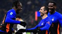 Gelandang Inter Milan, Henrikh Mkhitaryan, melakukan selebrasi setelah mencetak gol ke gawang Pisa dalam laga giornata 22 Serie A Liga Italia di Giuseppe Meazza, Sabtu (24/1/2026) dini hari WIB. (Piero CRUCIATTI / AFP)