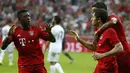 Robert Lewandowski merayakan gol yang dicetaknya ke gawang Real Madrid dalam final Audi Cup 2015 yang berlangsung di Stadion Allianz Arena, Munchen, Jerman. Kamis (6/8/2015) dini hari WIB. (Reuters/Michaela Rehle)