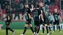 Runner-Up grup F, Arsenal. Dengan perjuangan berat klub asal kota London itu lolos ke babak 16 besar. (AFP/Louisa Gouliamaki)