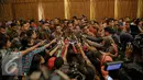 Presiden Joko Widodo memberikan keterangan pers usai membuka Musyawarah Nasional IV Adkasi di Jakarta, Kamis (17/12). (Liputan6.com/Faisal R Syam)