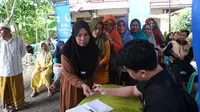 Berbagi Suka Cita Ramadan, Indonesia Re Salurkan Ratusan Paket Sembako