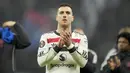 Pemain Manchester United, Diogo Dalot merayakan kemenangan timnya atas FCBS dalam laga lanjutan Liga Europa 2024/2025 di National Arena Stadium, Bucharest, Romania, Jumat (31/01/2025). (AP Photo/Andreea Alexandru)