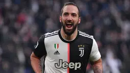 1. Gonzalo Higuain (90 juta euro) - Juventus menggelontorkan dana sebesar 90 juta euro untuk melabuhkan Gonzalo Higuain dari Napoli pada musim panas 2016. Pemain asal Argentina ini menjadi pemain Argentina yang memiliki transfer termahal hingga saat ini. (AFP/Marco Bertorello)