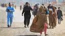 Gelombang pengungsi Afghanistan ini menyusul keputusan pemerintah Pakistan untuk mengusir orang-orang yang tinggal di negara tersebut secara ilegal. (Farooq Naeem/AFP)