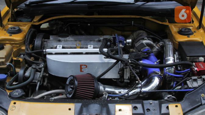 Peugeot 306 ini melakukan engine swap (Fahmi/Liputan6)