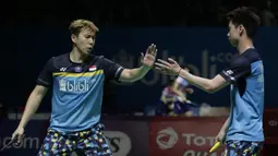 Ganda putra Indonesia, Marcus Gideon / Kevin Sanjaya, berhasil mengalahkan Ou Xuan Yi / Zhang Nan pada Indonesia Open 2019 di Istora Senayan, Jumat (19/7). Marcus / Kevin menang 21-12 dan 21-16. (Bola.com/Yoppy Renato)