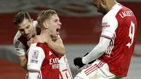 Pemain Arsenal, Emile Smith Rowe, merayakan gol yang dicetaknya ke gawang Newcastle United pada pertandingan Piala FA 2020/2021. (AP Photo/Matt Dunham)