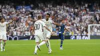 Real Madrid meraih kemenangan 2-0 atas Espanyol pada laga pekan kelima La Liga di Santiago Bernabeu, Sabtu (20/9/2025) malam WIB. Satu di antara gol Madrid dicetak Eder Militao.&nbsp;(AP Photo/Manu Fernandez)&nbsp;