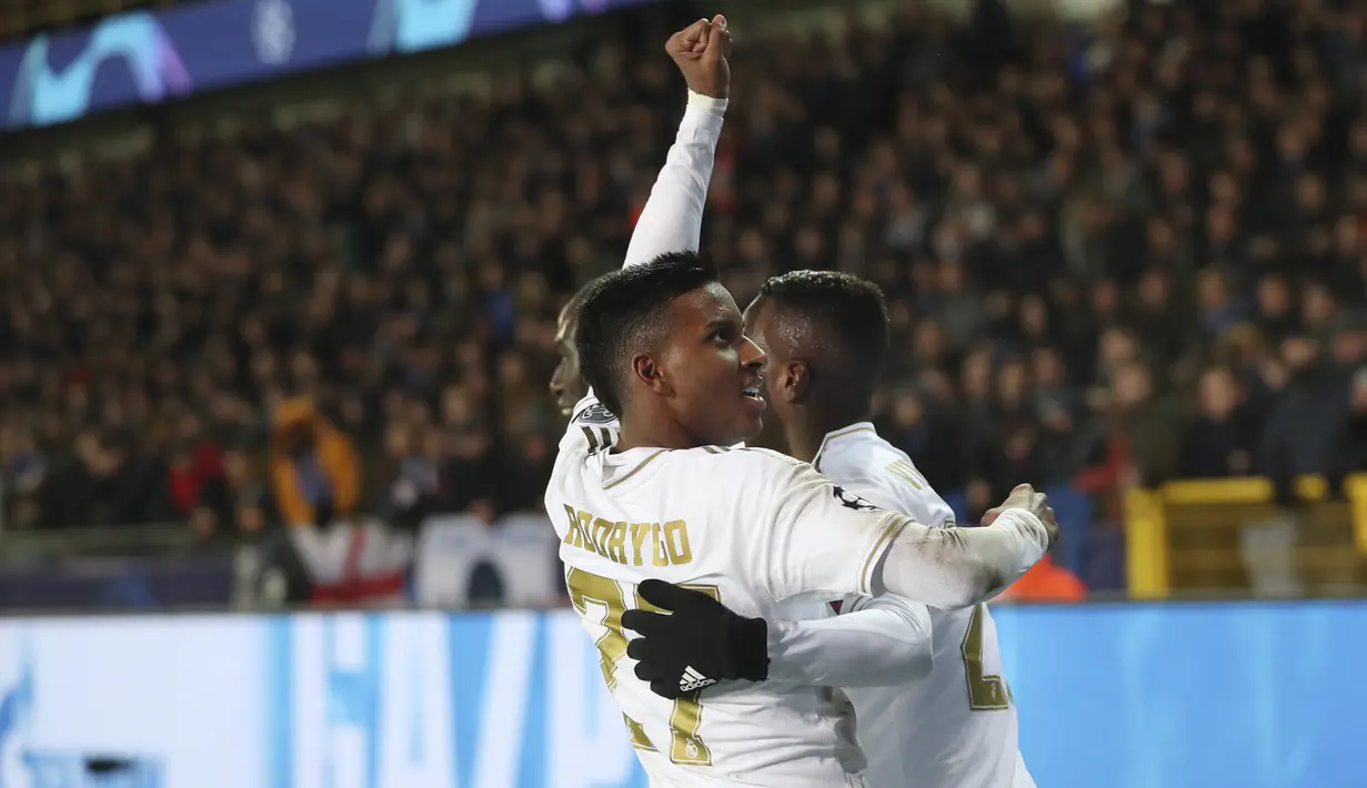 Penyerang Real Madrid, Rodrygo berselebrasi usai mencetak gol ke gawang Club Brugge pada pertandingan Grup A Liga Champions di stadion Jan Breydel di Bruges, Belgia (11/12/2019). Real Madrid menang 3-1 atas Club Brugge. (AP Photo/Francisco Seco)