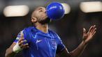 Pemain Chelsea, Christopher Nkunku melakukan selebrasi dengan meniup balon setelah mencetak gol ke gawang Southampton dalam laga lanjutan Liga Inggris 2024/2025 di Stamford Bridge, London, Rabu (26/02/2025) WIB. (AP Photo/John Walton)