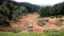 Lokasi tanah longsor di perkebunan organik, Batang Kali, Malaysia, Jumat (16/12/2022). Sebanyak 16 orang ditemukan tewas akibat bencana tanah longsor tersebut. (AP Photo/FL Wong)