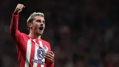 Penyerang Atletico Madrid #07 Antoine Griezmann berselebrasi setelah mencetak gol kedua timnya ke gawang Villarreal dalam lanjutan LaLiga Spanyol 2023/2024 di Stadion Civitas Metropolitano, Senin (13/11/2023) dinihari WIB. (Thomas COEX / AFP)