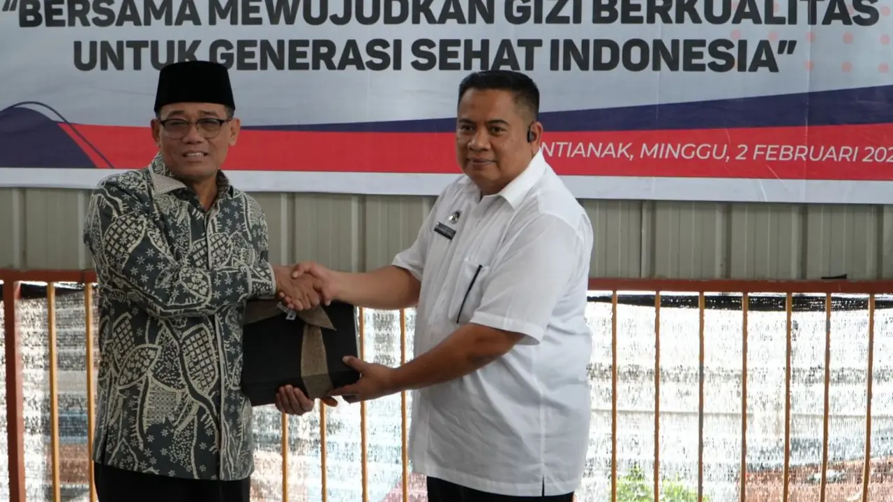 Direktur Kerja Sama dan Kemitraan di Kedeputian bidang Promosi dan Kerja Sama BGN, M. Risal Salewangang dan Anggota Komisi IX DPR RI Dapil KalBar 1, Alifudin