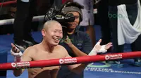 Yoshitaka Kato, tampak kecewa usai gagal meraih kemenangan  atas Daud Yordan. (Bola.com/Nicklas Hanoatubun)