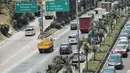 Kendaraan melintasi ruas Tol Jakarta Outer Ring Road (JORR), di Jakarta, Senin (17/9). Integrasi transaksi tol merupakan tahapan menuju transaksi tol menerus atau multilane free flow (MLFF) yang akan diberlakukan pada 2019. (Liputan6.com/Faizal Fanani)