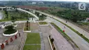 Foto udara suasana jalan sekitar depan Stadion Pakansari, Kab Bogor, Jawa Barat, Senin (13/4/2020). Bupati Bogor Ade Yasin menyatakan Pembatasan Sosial Berskala Besar pencegahan penularan virus COVID-19 akan fokus di 11 kecamatan yang masuk kategori zona merah. (Liputan6.com/Helmi Fithriansyah)