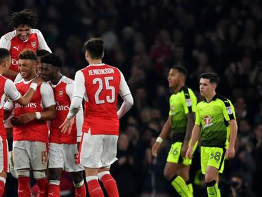 Arsenal melaju ke perempat final Piala Liga Inggris usai menyingkirkan Reading dengan skor 2-0 pada laga 16 besar di Stadion Emirates, Rabu (26/10/2016) dini hari WIB. Alex Oxlade-Chamberlain memborong 2 gol. (Action Images via Reuters/Tony O'Brien)