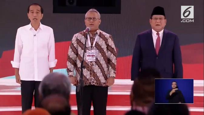 Jokowi dan Prabowo Subianto dalam debat kedua capres 2019. ()