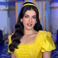 Lihat di sini gaya riasan Tasya Farasya saat menjadi princess Belle di pesta ulang tahun putrinya, Maryam. [@hairbyranggayusuf].