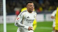 Bomber Real Madrid Kylian Mbappe merayakan golnya ke gawang Villarreal di jornada 21 Liga Spanyol 2025/2026 di La Ceramica, Minggu (25/01/2026) dini hari WIB. (AP Photo/Alberto Saiz)