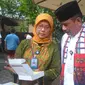 Kepala Balai Besar POM Jakarta Dra. Dewi Prawitasari dan Kasudin Pendidikan Wilayah II Feri Safarudin