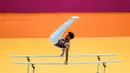 <p>Pesenam putra Indonesia, Abiyu Raffi beraksi pada nomor palang sejajar dalam Kejuaraan Dunia Gimnastik 2025 di Indonesia Arena, Senayan, Jakarta, Senin (20/10/2025). (Bola.com/Bagaskara Lazuardi)</p>