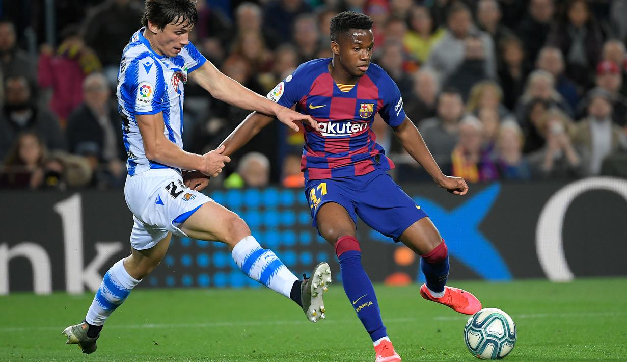 Ansu Fati menjalani debut bersama Barcelona di Liga Spanyol musim 2019-2020 pada laga kontra Real Betis, 25 Agustus 2019. (AFP/Lluis Gene)