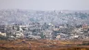 Sedikitnya 151 orang tewas dalam gelombang serangan tanpa henti di seluruh wilayah Palestina tersebut dalam 24 jam pada Minggu 18 Mei 2025. (Menahem KAHANA/AFP)