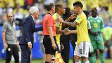 James Rodriguez cedera dalam laga melawan Senegal. (AP/Martin Meissner)