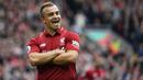 Xherdan Shaqiri berhasil mendapatkan gelar Liga Champions bersama Liverpool pada tahun 2019. Shaqiri sebelumnya juga pernah menyabet gelar tersebut saat berseragam Bayern Munchen di tahun 2013. (AFP/Paul Ellis)