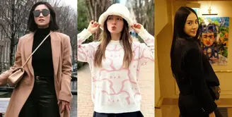 Saat berkunjung ke Atlanta, Georgia, Natasha Wilona memperlihatkan sisi feminin-nya lewat sweater nuansa pink-putih, dipadukan bersama leather skirt, long pants, dan fur bucket hat. [@ natashawilona12]
