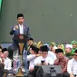 Presiden Joko Widodo atau Jokowi memberi sambutan pada Harlah ke-73 kepada Muslimat NU di Stadion Utama GBK, Jakarta, Minggu (27/1). Jokowi berharap muslimat NU makin jaya dan mendapatkan anugerah dari Tuhan. (Liputan6.com/Johan Tallo)