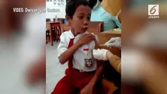 Macam-macam reaksi dikeluarkan anak SD saat dihadapkan dengan jarum suntik. Salah satunya anak SD yang satu ini.