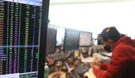 Layar komputer menunjukkan Indeks Harga Saham Gabungan (IHSG) di Jakarta, Kamis (9/9/2021). IHSG Bursa Efek Indonesia (BEI) pada Kamis sore ditutup menguat 42,2 poin atau 0,7 persen ke posisi 6.068,22 dipicu aksi beli oleh investor asing. (Liputan6.com/Angga Yuniar)