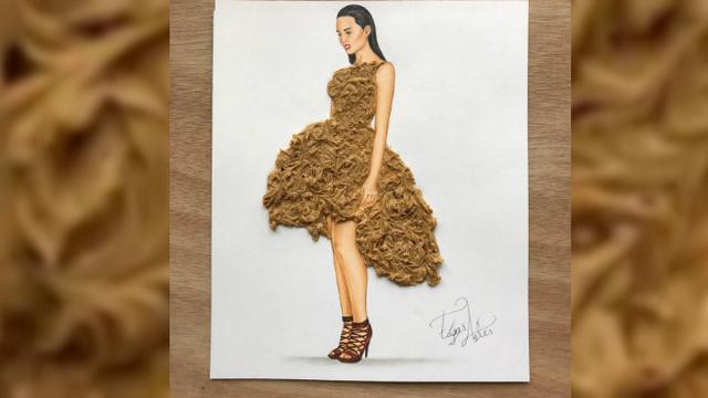 Seorang perancang busana memberi sentuhan kreatif dengan menambahkan makanan-makanan tertentu pada sketsa baju yang dibuatnya.