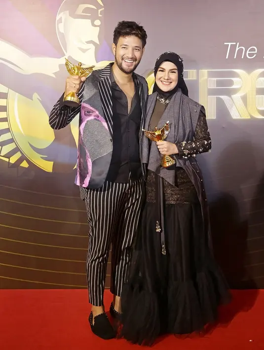 Ammar Zoni dan Irish Bella Raih Penghargaan FFI 2019. (Bambang E Ros/Fimela.com)